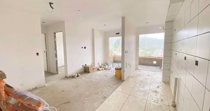 Apartamento com 2 dormitórios à venda, 57 m² por R$ 480.000,00 - Canto do Forte - Praia Grande/SP
