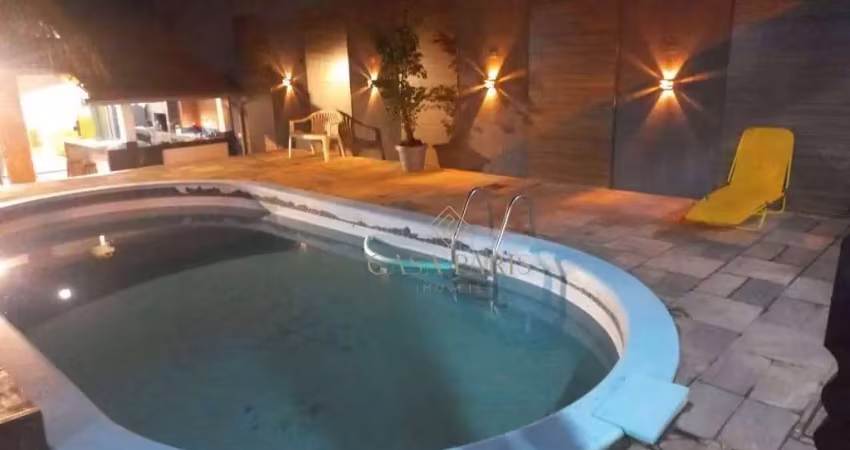 Sobrado com piscina e 3 dormitórios à venda, 240 m² por r$ 780.000 - maracanã - praia grande/sp