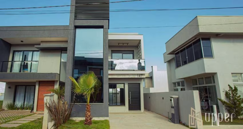 Casa com 3 dormitórios à venda, 137 m² por R$ 950.000,00 - Condomínio Primavera - Gravataí/RS
