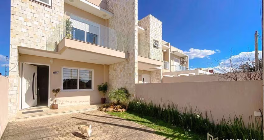 Casa com 3 dormitórios à venda, 140 m² por R$ 695.000,00 - Renascença - Gravataí/RS