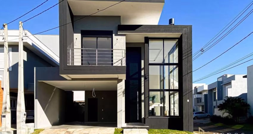 Casa com 3 dormitórios à venda, 200 m² por R$ 1.590.000,00 - Condomínio Villagio Piacenza - Cachoeirinha/RS