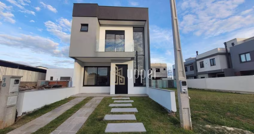 Casa com 3 dormitórios à venda, 130 m² por R$ 799.000 - Condomínio Central Square - Gravataí/RS