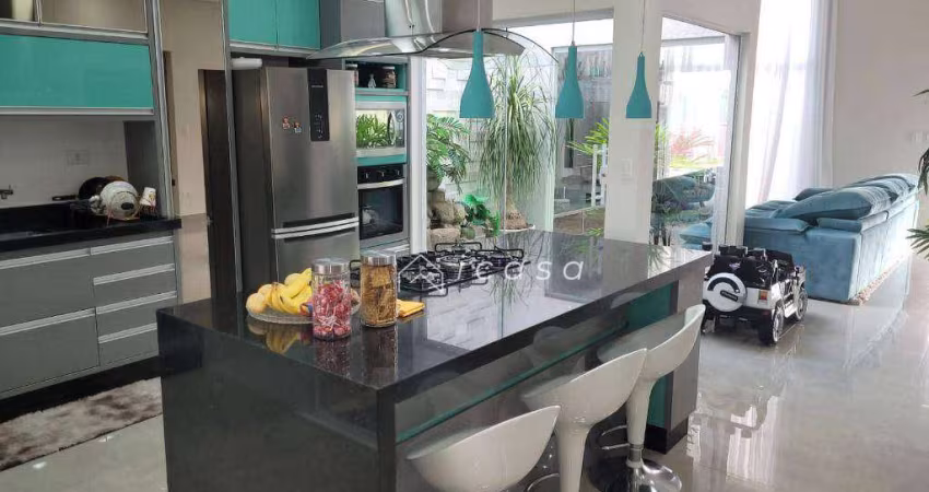 Casa com 3 dormitórios à venda, 220 m² por R$ 1.100.000,00 - Residencial Tecoara - Taubaté/SP