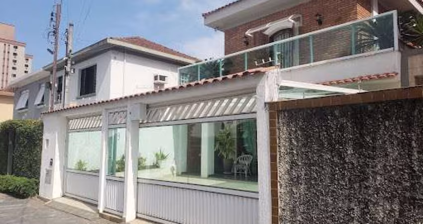 Sobrado, 380 m² - venda por R$ 3.000.000,00 ou aluguel por R$ 20.860,00/mês - Embaré - Santos/SP