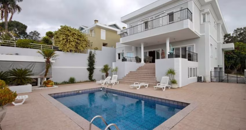 Casa para venda e locação por R$ 6.800.000,00 ou R$ 60.000,00/mês  em Alphaville Barueri-SP.