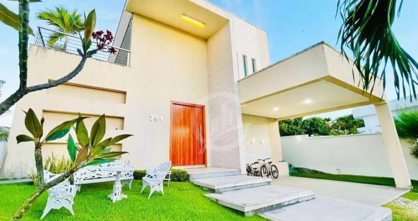 Belíssima casa no condomínio alphaville fortaleza com 05 suítes.