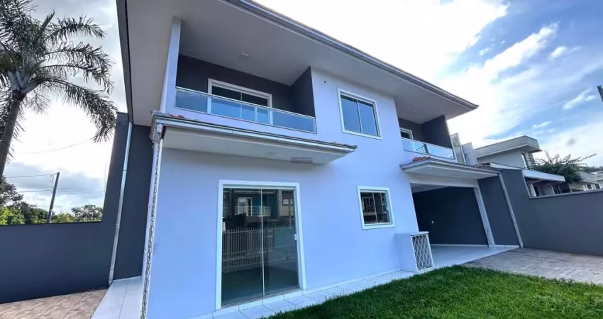 Sobrado geminado de esquina à venda no bairro jardim sofia - loteamento santos dumont - joinville/sc.  sala de estar e jantar integradas; cozinha inde