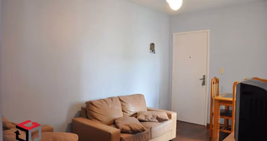 Apartamento com 2 quartos, 1 vaga de garagem e sacada.