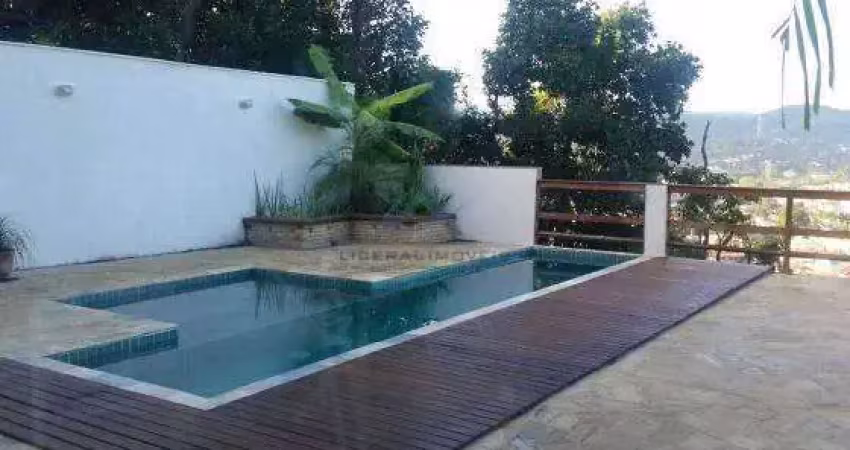 Casa em condomínio fechado com 4 quartos à venda na Rua Antônio Rusch, Maria Paula, São Gonçalo
