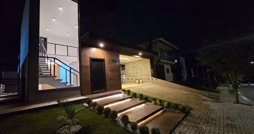 Casa terrea imponente com pe direito alto mezanino 03 suites condominio terras de atibaia