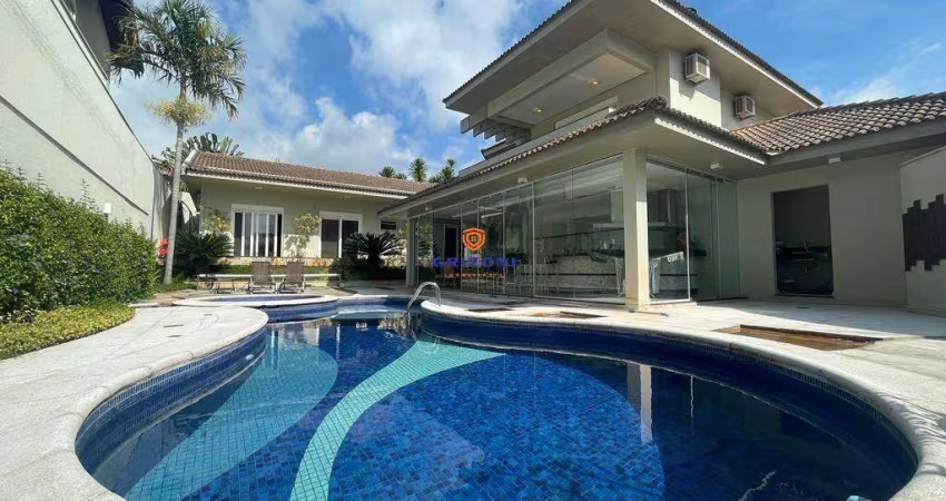 CASA RESIDENCIAL TIVOLI 1 | 5 SUÍTES | 3 SALAS | 7 BANHEIROS | 4 VAGAS