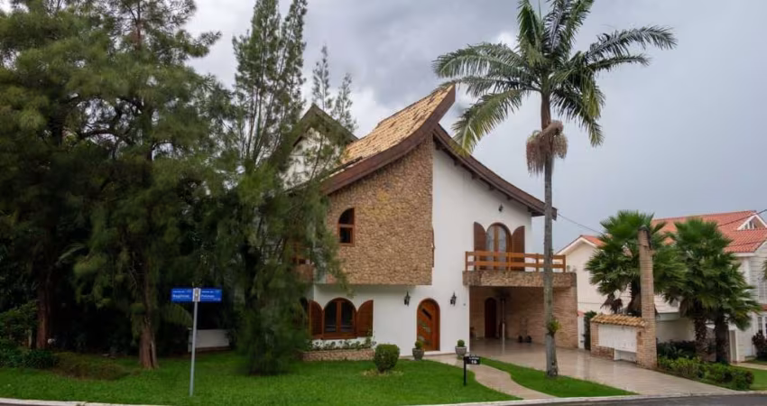 Casa com 4 dormitórios à venda, 422 m² por R$ 2.800.000 - Residencial Cinco (Alp