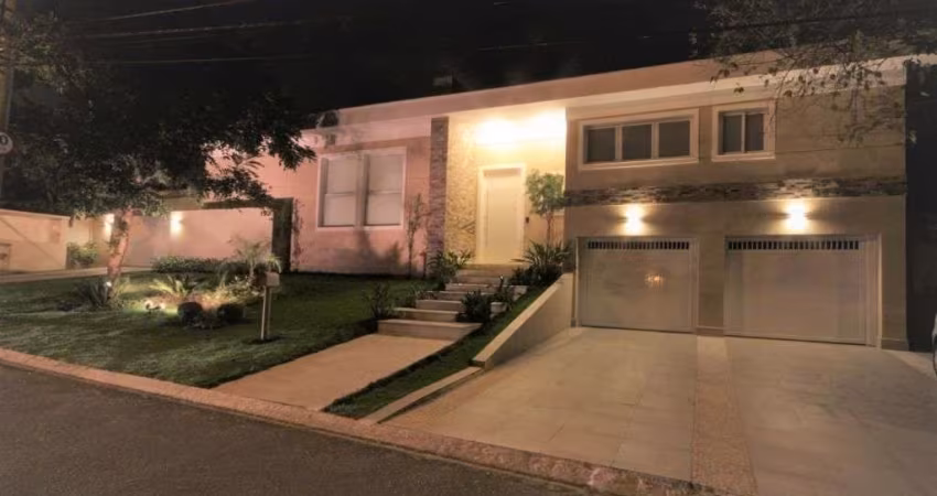 Casa com 5 dormitórios à venda, 560 m² por R$ 4.500.000 - Residencial Tres (Alph