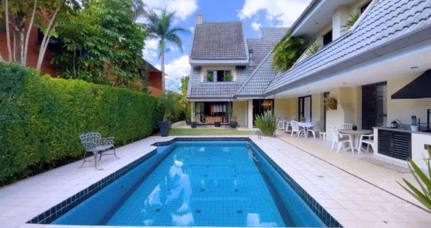 Casa com 4 dormitórios à venda, 428 m² por R$ 4.800.000 - Alphaville Residencial