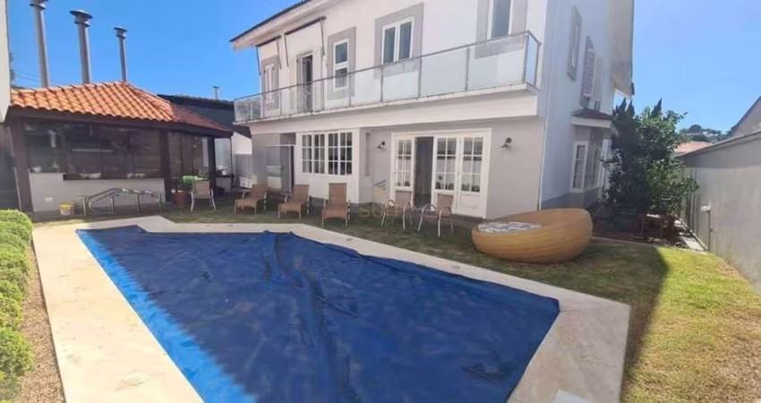 Casa com 4 dormitórios à venda, 598 m² por R$ 4.500.000 - Alphaville Residencial