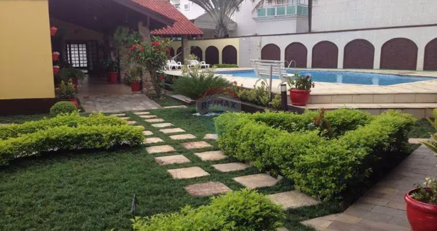 Casa em condomínio com 5 suítes para locação em bertioga-sp.