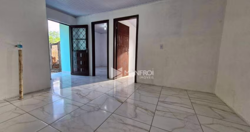 Casa com 2 dormitórios para alugar por R$ 1.015,00/mês - Maria Regina - Alvorada/RS