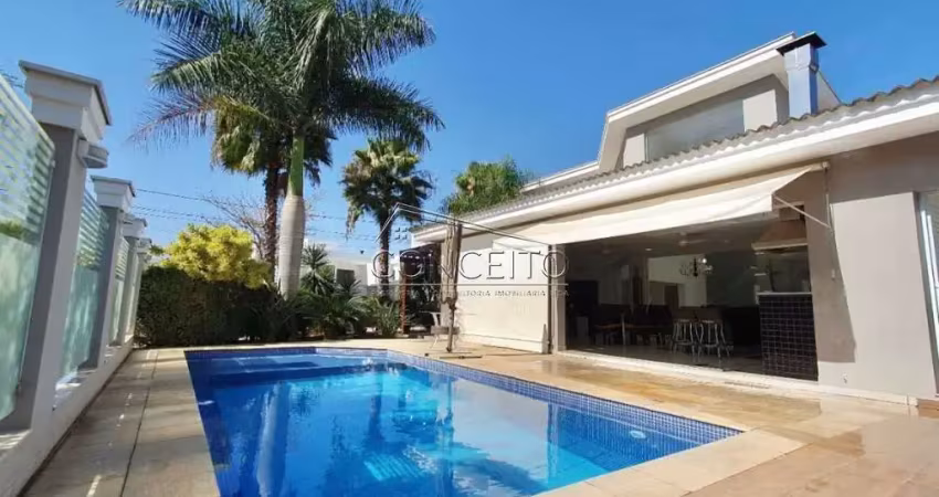 Casa térrea de alto padrão para venda ou locação no condomínio damha i com área construída de 394 m² | 5 suítes, sauna úmida e 6 vagas de garagem.