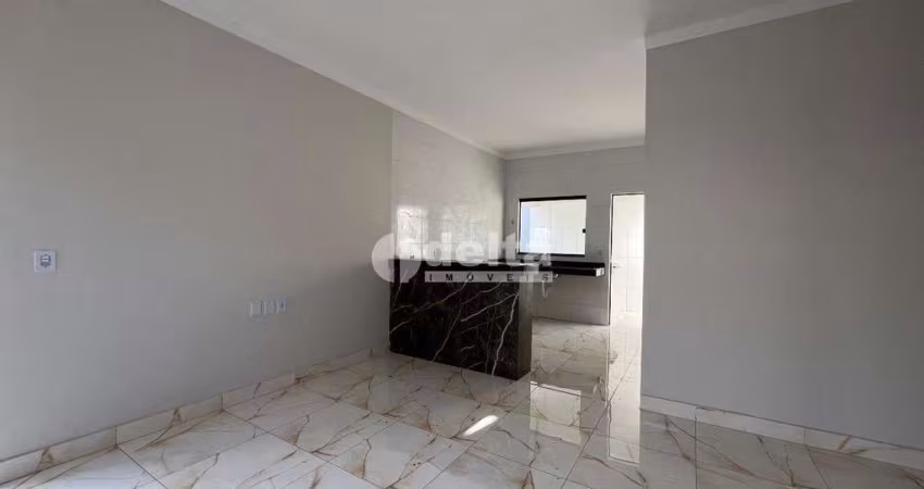 Casa residencial disponível para venda no bairro Jardim Canaã em Uberlândia-MG