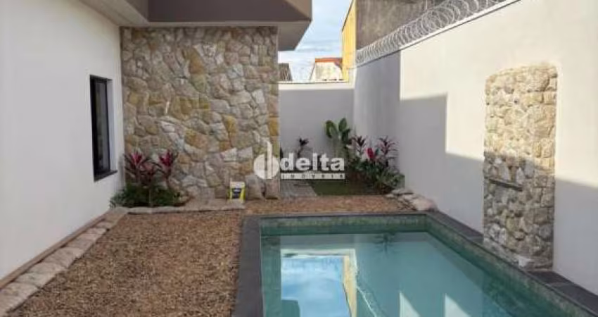 Casa residencial disponível para venda no bairro Cidade Jardim em Uberlândia-MG.