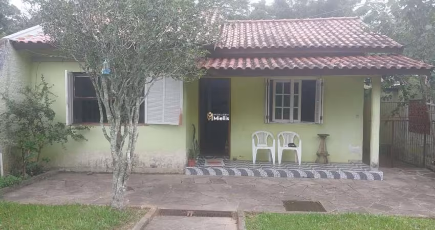 Casa à venda em Viamão, bairro Esmeralda, com terreno grande.