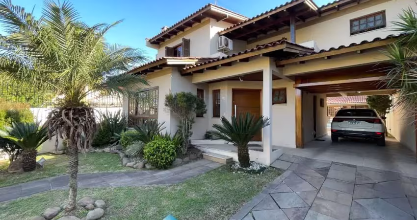Casa com 3 dormitórios à venda, 262 m² por r$ 1.400.000,00 - dom feliciano - gravataí/rs