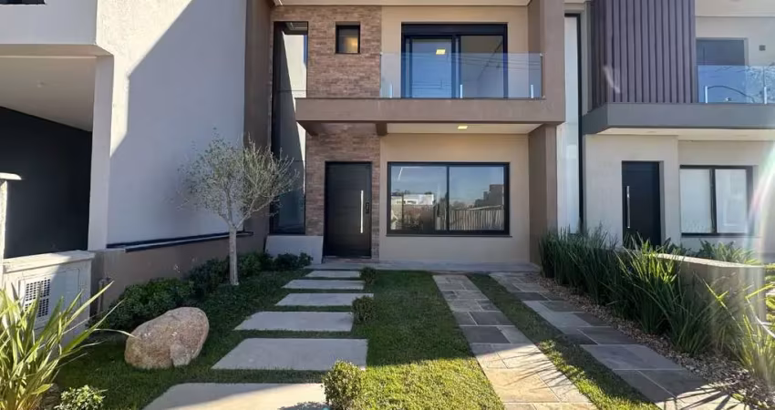 Casa com 3 dormitórios à venda, 130 m² por r$ 850.000,00 - condomínio central square - gravataí/rs