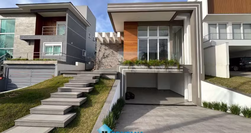 Casa com 3 dormitórios à venda, 220 m² por r$ 2.190.000,00 - alphaville - gravataí/rs