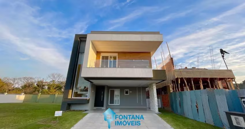 Casa com 3 dormitórios à venda, 191 m² por r$ 1.650.000,00 - terras alpha - gravataí/rs