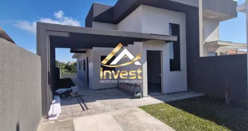 Casa espaçosa com 3 quartos, pé direito alto e grande terreno – conforto e estilo com passagem lateral!