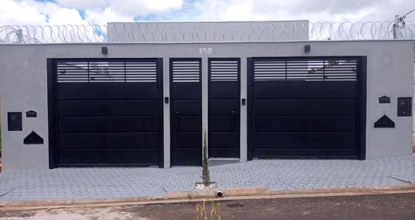 Casa à venda em Uberlândia-MG: 2 quartos, 1 suíte, 2 banheiros, 2 vagas de garagem e 70m² no Jardim Holanda. Encante-se!