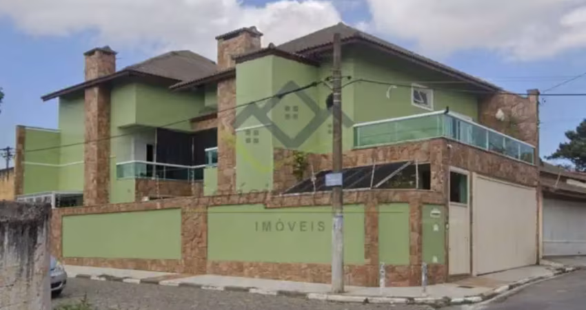 Sobrado com 3 dormitórios à venda, 308 m² por R$ 1.200.000,00 - Centro - Poá/SP