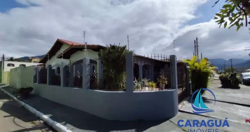 Casa de esquina, 3 dormitórios e 2 suítes no Indaiá, Caraguatatuba - SP