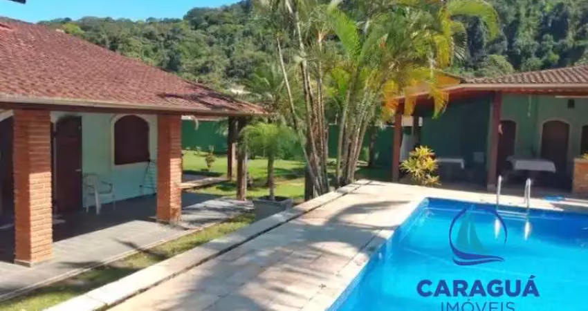 Casa de 4 dormitórios, mais um reversível, com 300m² e 720m² de terreno no residencial verdemar, massaguaçu, caraguatatuba - sp