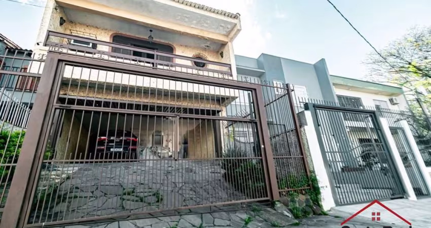 Casa com 3 quartos à venda na Rua Doutor Eduardo Chartier, 275, Passo da Areia, Porto Alegre