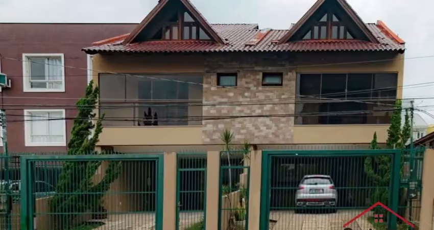 Casa com 3 quartos à venda na Rua Dom Jaime de Barros Câmara, 705, Sarandi, Porto Alegre