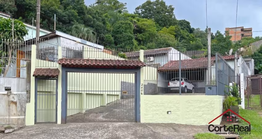 Casa com 3 quartos à venda na Avenida Vicente Monteggia, 2406, Vila Nova, Porto Alegre