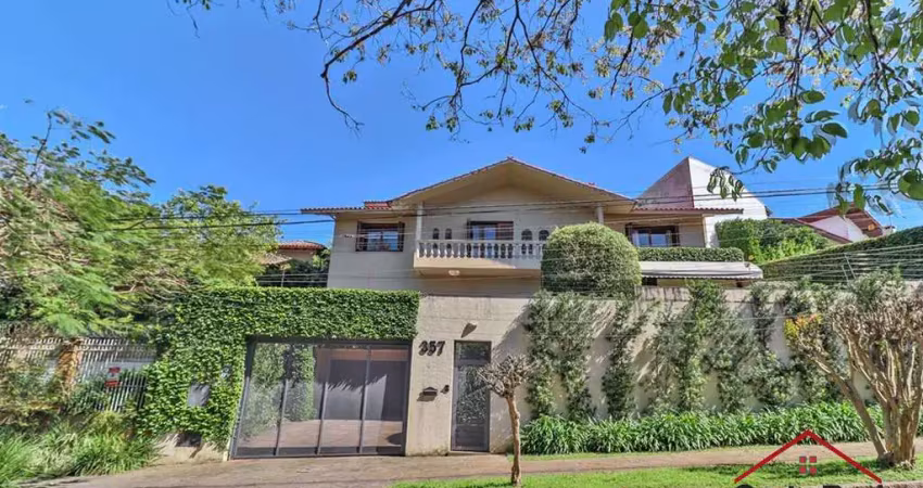 Casa com 4 quartos à venda na Rua Felipe Becker, 357, Três Figueiras, Porto Alegre