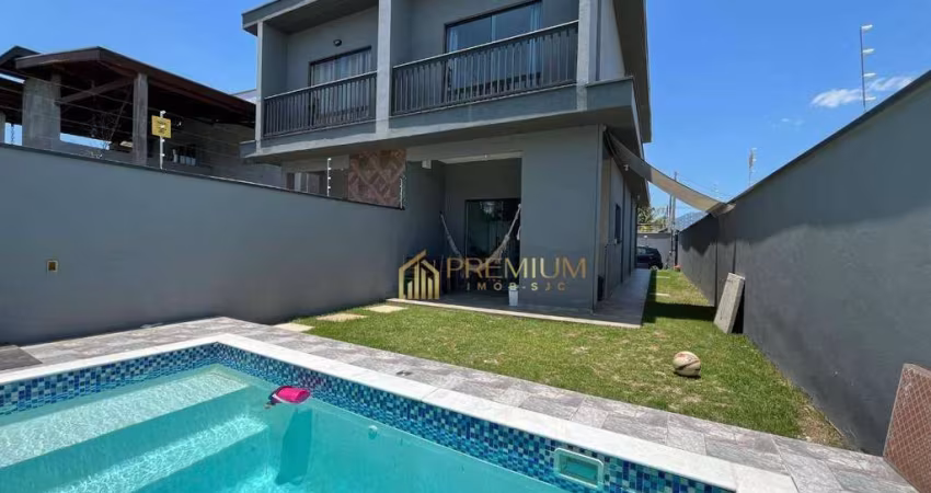 Casa com 3 dormitórios à venda, 100 m² por R$ 660.000,00 - Balneário dos Golfinhos - Caraguatatuba/SP