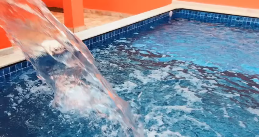 Casa com piscina lado praia