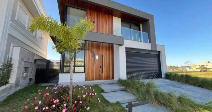 Casa de alto padrão com 3 suítes e piscina no bairro pedra branca – palhoça