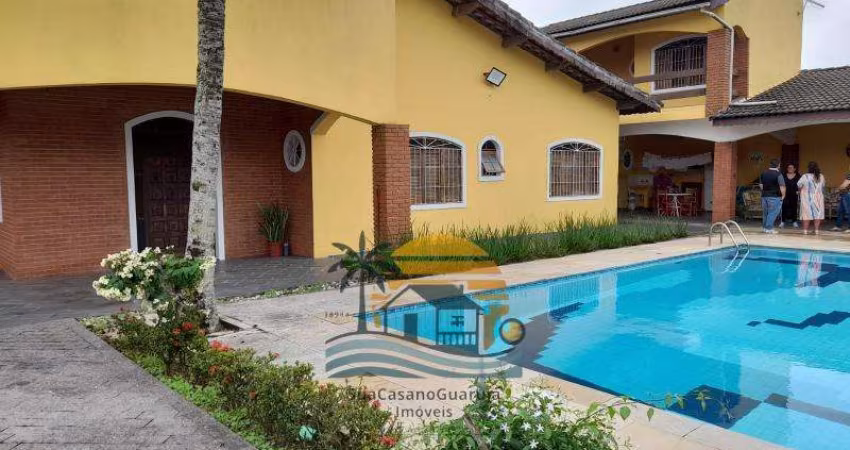 Casa com 4 suítes piscina churrasqueira 6 vagas na Praia Suarão - Itanhaém