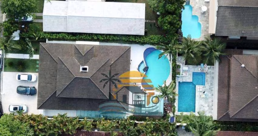 Casa em condomínio fechado 5 suítes 5 vagas piscina na Enseada