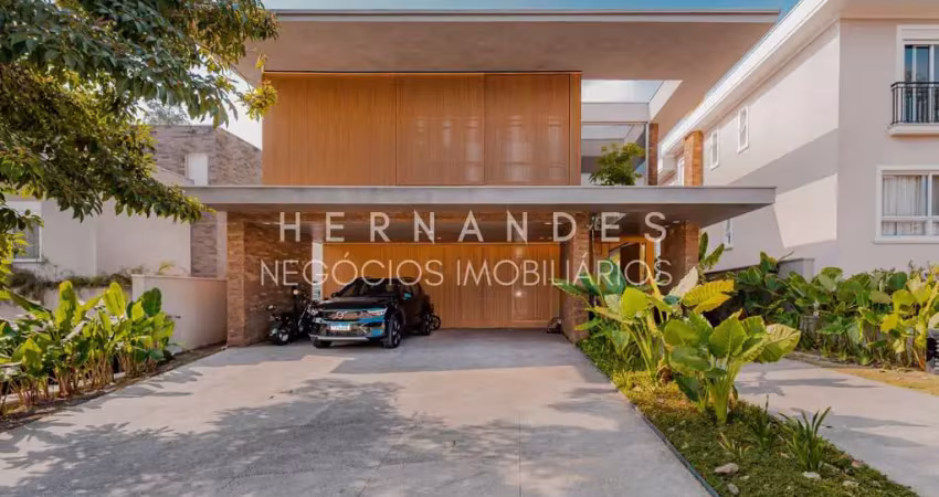 Casa de luxo à venda em tamboré - santana de parnaíba-sp  4 quartos, 4 suítes, 3 salas, 6 banheiros, 3 vagas de garagem  mobiliada e decorada  projeto exclusivo rodrigo latorre  área de 501m²  piscina