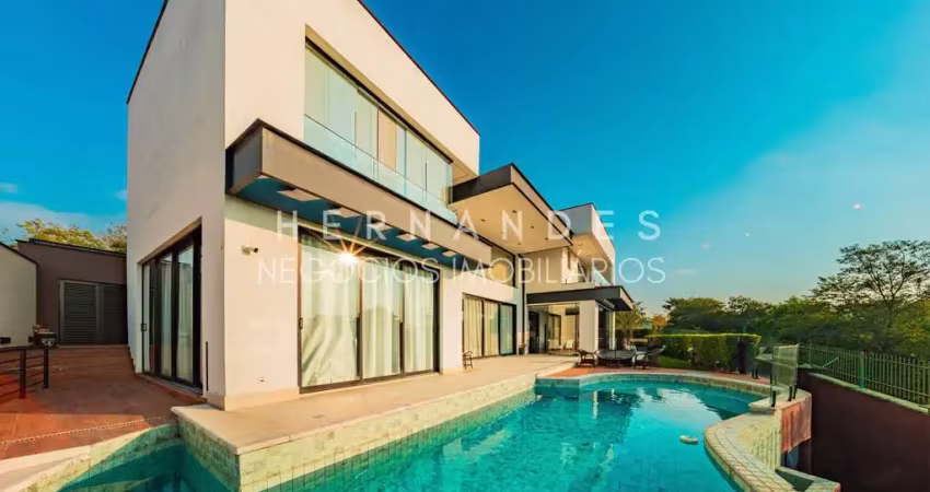 Luxuosa casa de 4 suítes em condomínio exclusivo de alphaville, santana de parnaíba-sp! com 634,95m², piscina e vista incrível.