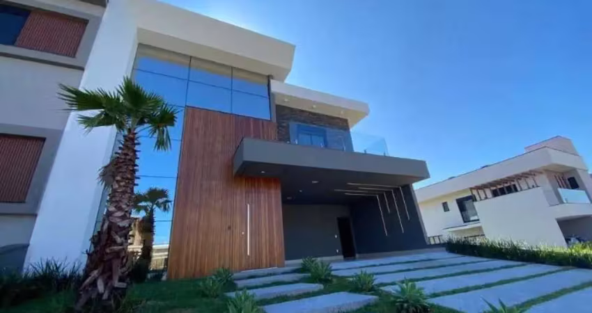 Sobrado moderno em condomínio fechado com 4 suítes e piscina