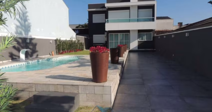 Sobrado com 4 dormitórios à venda, 164 m² por R$ 1.690.000,00 - Balneário Praia Grande - Matinhos/PR