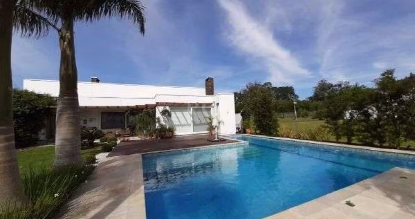Casa Condominio em Porto Alegre, no bairro Belém Novo, com 3 dormitório(s), e 3