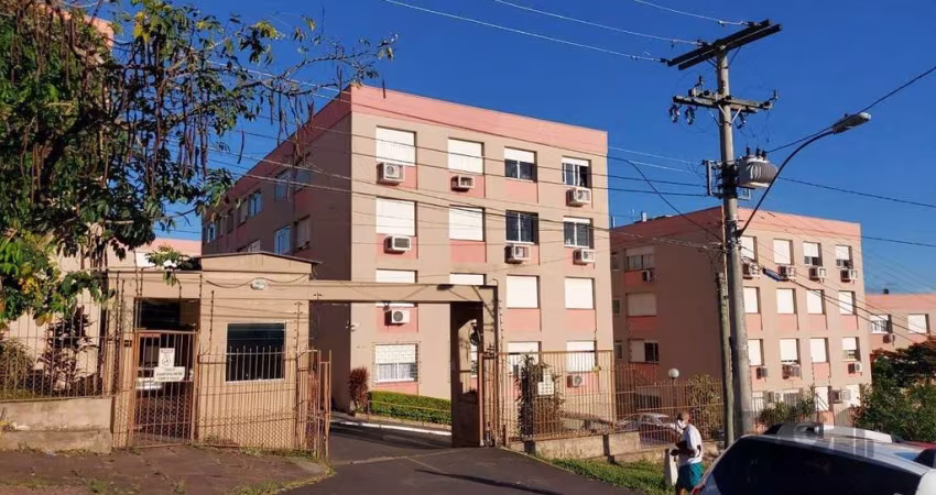 Apartamento de dois dormitórios com uma vaga de garagem no bairro Cristal em Por