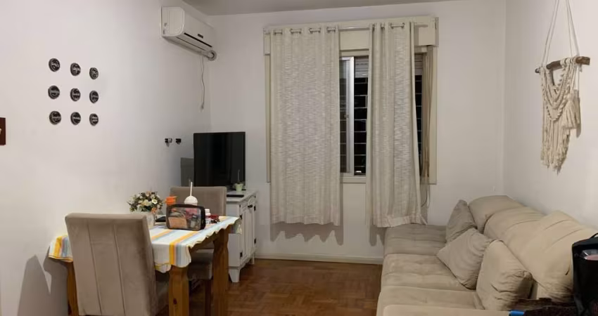 Apartamento de 2 dormitórios, living, cozinha, área de serviço e banheiro social